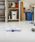 Heavy Duty Stainless Steel Socket Head Screw Kit With Allen Wrench 300 Pieces on garage floor near tools and shelves