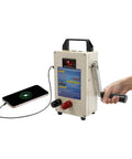 Hella Durable Hand Crank Generator, Portable 15600mAh Power Station For Emergency Backup charging a smartphone with hand crank.