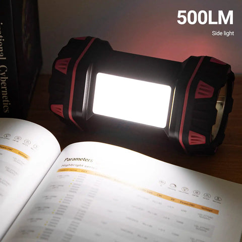 Rechargeable Camping Lantern With 1500 Lumen Output And 8 Lighting Modes illuminating a book with side light indoors.