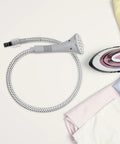 Replacement Steam Hose And Nozzle Kit For Garment Steamer With Clip Design near folded clothes and iron