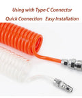 Premium Extra Heavy Duty PU Compressor Hose With A Snappy Flexible Spring Like Fit For Pneumatic Tools, Orange 12X8MM 33Foot Pro Garage Ready Air Tubing Setup, showing orange coil and clear tubing with connectors.