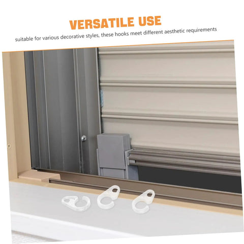 40 Pack Plastic Curtain Hooks For Doors And Curtain Rods With Silent Glide shown near a window frame for versatile use.