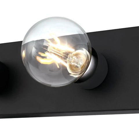 Close-up of bulb on Four Light Vanity Light Fixture in Matte Black Low Profile Backplate Fits Tight Spaces Between Cabinets and Ceiling.
