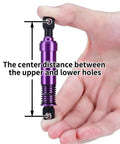 Hand holding RC Crawler Shocks 75mm-115mm Bore for 1/10 Scale Builds, highlighting center distance measurement, purple metal, black ends.