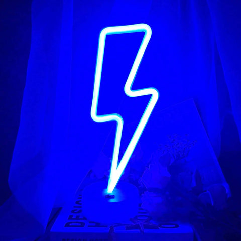 Lit Lightning Bolt Neon Sign With Base USB And Battery Powered Blue LED Light For Bedroom Decor on a desk