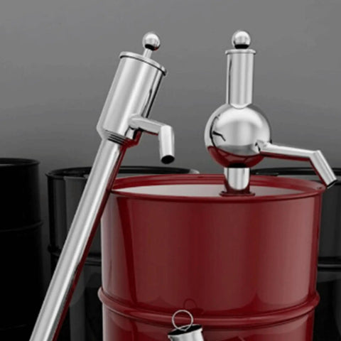 Stainless Steel Manual Oil Transfer Pump Hand Operated Liquid Extractor With Comfort Grip For Quick Barrel Transfers In Workshop Or Garage 180L 200L 300L Barrels, on red drum