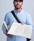 Man holding Extra Large Bubble Mailers 14x19 Inches Resealable Padded Envelopes Waterproof Shipping Bags White 30 Pack