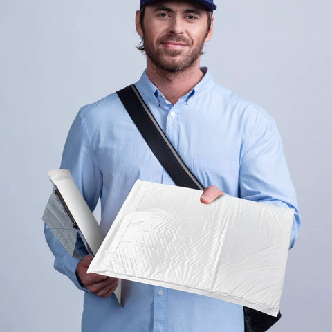 Man holding Extra Large Bubble Mailers 14x19 Inches Resealable Padded Envelopes Waterproof Shipping Bags White 30 Pack