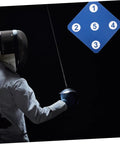 Fencer practicing with Two Pack Rubber Fencing Targets For Practice And Training, durable blue target on wall.