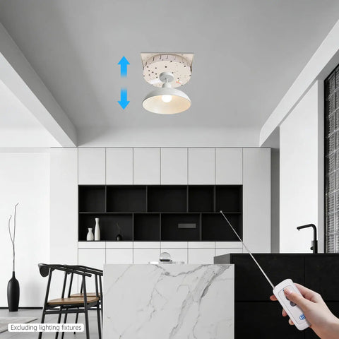 Heavy Duty Electric Chandelier Hoist With 220 Lb Load Capacity And 26 Ft Lift Stroke For Ceiling Fixtures in a modern kitchen, demonstrating remote operation.