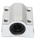 Premium 10 mm SCS10UU Linear Motion Ball Bearing Slide Bushing Block Built Tough For Heavy Duty Shop Tasks With A Sleek Silver Finish, front view.