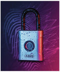 Fingerprint Smart Lock With 360 Degree Recognition For Quick Access No Key Needed, Supports Up To 20 Embedded Prints, Lasts Up To 10,000 Unlocks On One Battery, Replaceable CR2 Battery, Spring Loaded Double Locked Shackle, Sleek Silver shown wet on digital background