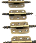 Eight Piece Vintage Antique Brass Flap Hinges With Lengthened Axis For Wooden Boxes Jewelry Cases Cabinets And Cupboards, Overall Length About Two And Three Quarters Inches, Plate Length One And Half Inches, Open Width One And Eleven Thirty Seconds displayed in a set