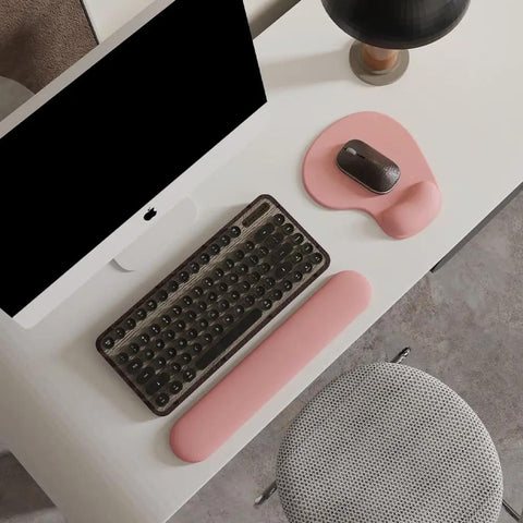 Pink Gel Wrist Rest Mouse Pad For Desk And Gaming, Ergonomic Comfort With Non Slip Silicone Surface And Rubber Base on desk