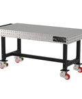 Boss Grade Heavy Duty Welding Fixture Table With Precision Laser Cut Hole Grid And Sweet Rolling Non Marking Casters 72 By 36 By 36 Inch mobile shop bench with metal surface and wheels.