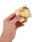Hand holding a Vintage Brass Cabinet Pull Handle Set with Drop Ring Knobs, 6cm square edge, pure brass Chinese style hardware.