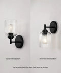 AOIOUR 10.4" 1‑Light Farmhouse Vanity Wall Sconce, Ribbed Glass Matte Black, shown in upward and downward installation.