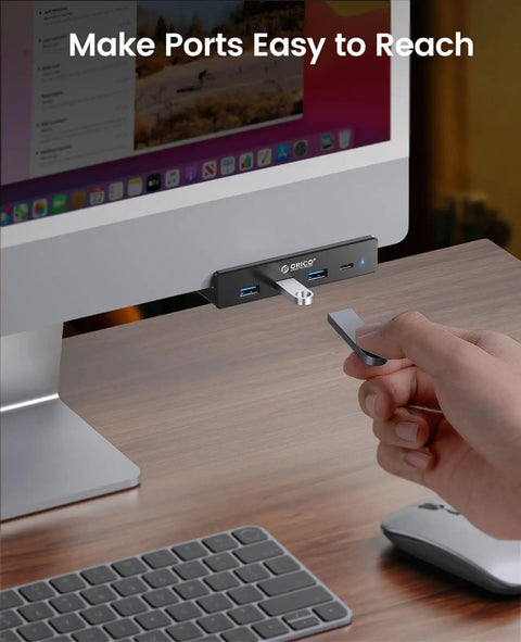 Clamp On USB Hub With External Power Sleek Aluminum 4 Port USB 3.0 Adapter With Three USB A Data Ports And A USB C Port For Monitors Desk Setup Built To Handle Power Hungry Peripherals Black installed on monitor