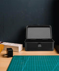 Open two pack metal tool box storage case organizer with secure latch, shown on a workshop table for DIY projects and carpentry.