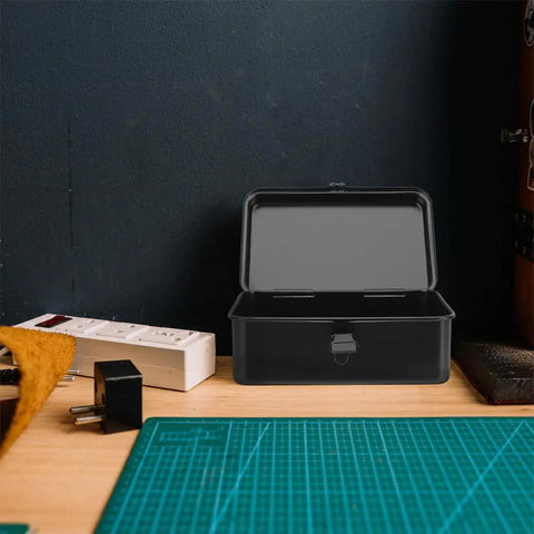 Open two pack metal tool box storage case organizer with secure latch, shown on a workshop table for DIY projects and carpentry.
