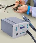 Pro Grade Digital Display Hot Air Rework Station with precise temperature control, electronics repair in progress in background.