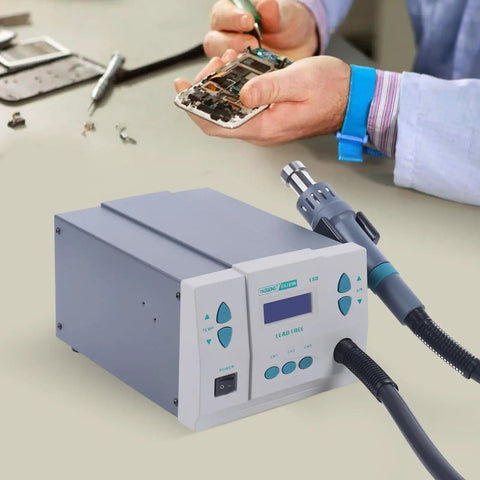 Technician using Powerhouse 1000W Hot Air Rework Station with Turbo Brushless Fan on a circuit board repair task