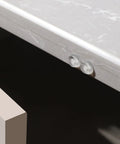 Clear Self Adhesive Cabinet Bumpers Shield Furniture From Harsh Door Slams And Cut Down Household Noise Soft Silicone Rubber Pads Deliver Rock Solid Grip Without Leaving Residue 96 Piece Set Ensures Bangfree Peace Of Mind For Any Home Gamechanger Project close-up view on kitchen cabinet edge.