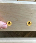 Top Shelf Vintage Style Brass Screws With Flush Caps, Self Tapping Decorative Fasteners For Antique Cabinets And Wooden Boxes, Straight Up 15mm Gold Finished Hardware Pack Of 16, installed in wood surface.