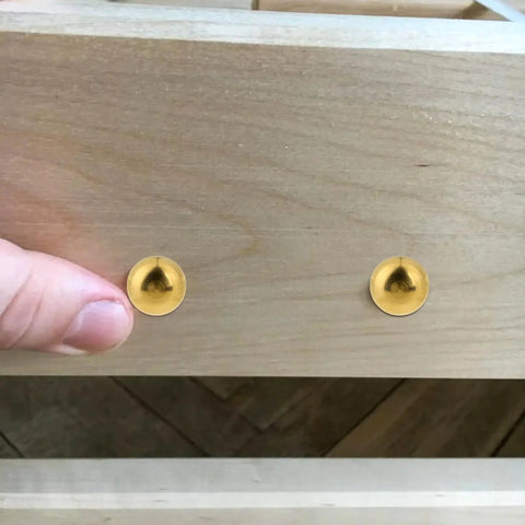 Top Shelf Vintage Style Brass Screws With Flush Caps, Self Tapping Decorative Fasteners For Antique Cabinets And Wooden Boxes, Straight Up 15mm Gold Finished Hardware Pack Of 16, installed in wood surface.