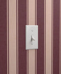 Slick Leather Texture Vinyl Wallcovering With Badass Durability Designed For Busy Hotels And Restaurants Featuring Custom Print Options And Professional Grade Installation, featuring a purple striped design and light switch.