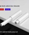 Push To Open Magnetic Cabinet Latch Set 2 Pack Door Catch And Drawer Closer with white cylindrical design on table