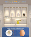 Adetu 4 Pack 2 inch 5CCT LED Gimbal Recessed Light, 5W=50W, 550LM, 120V compared to an egg in a lit shelf.