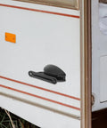 Heavy Duty Nylon Door Catch Retainer Set For Rv Camper Motorhome With Noise Reduction Technology mounted on RV side.