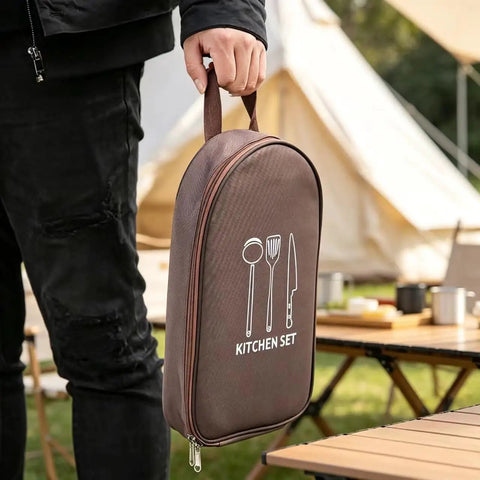 Person holding a brown kitchen set bag outdoors. Waterproof Camp Kitchen Knife Bag With Large Capacity Storage And Hooks.