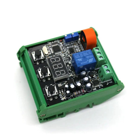 Kickass 50 Amp Electric Current Sensor Module With Sick AC Current Transducer Capabilities And Straight Up DC 24V Switching Output showing green circuit board with display and components.