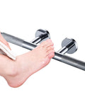 Woman using Shower Foot Rest Bar Wall Mount Brass Ledge Easy Leg Shaves Polished Chrome for leg shaving in shower