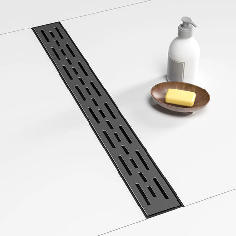 36 Inch Linear Shower Drain with Rectangular Brick Pattern Grate in Matte Black Dope Finish installed in modern bathroom floor