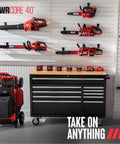 No Fuss 40v Cordless Chainsaw With Brushless Motor And Auto Lubrication Features Tool Free Adjustment Comes Loaded Up With Rapid Charge battery collection displayed in workshop.