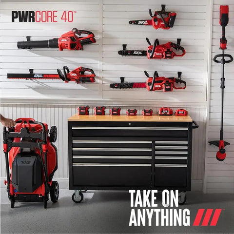 No Fuss 40v Cordless Chainsaw With Brushless Motor And Auto Lubrication Features Tool Free Adjustment Comes Loaded Up With Rapid Charge battery collection displayed in workshop.