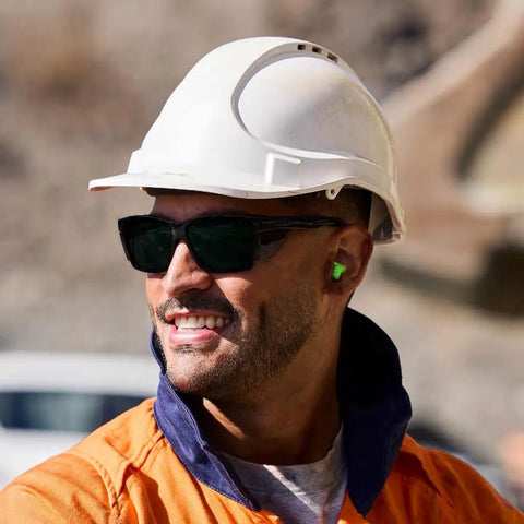 Man wearing Heavy Duty Full Frame Shield Safety Glasses With Kickass Polarized Cobalt Mirror Lenses for outdoor work.