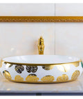 Bathroom Sink Hotel Bathroom Wash Basin Oval Above Table Basin Gold Leaf Flower Art Basin Decorative Wash Basin Bathroom Sink Vessel, side view.
