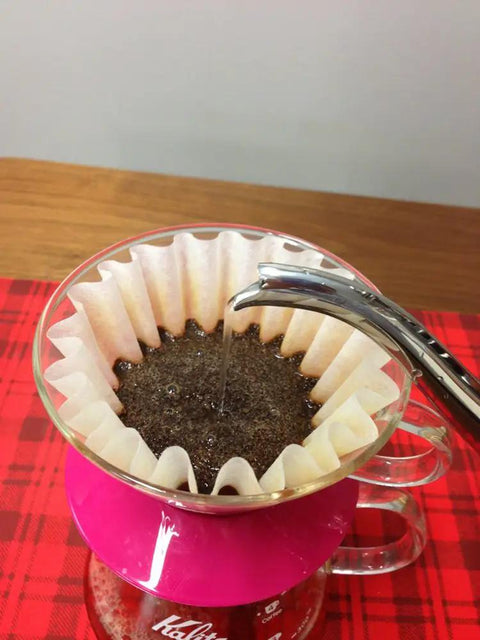 Wave Filters 185 Pack Of 100 White Coffee Filters for drip coffee in pour over brewing setup, preserve flavor.