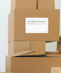 Self Adhesive Packing List Envelopes With Window Design on a cardboard box for bulk item shipping