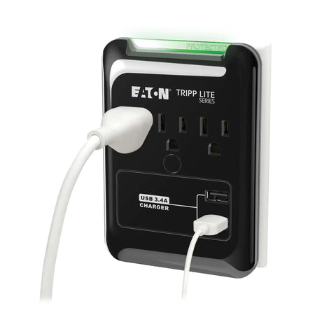 Three Outlet Travel Surge Protector With Two USB Ports, 540 Joules, mounted on wall with plugged cables