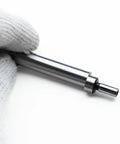 Close-up of Industrial Grade Mechanical Edge Finder Featuring .200-Inch Tactile Contact Tip and 3/8-Inch Shank held in a gloved hand.
