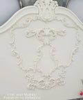 Vintage-style headboard featuring ornate details and neutral tones that complements Drop Cloth Chalk Mineral Paint For Furniture In Matte Linen White 16 Oz Easy DIY Chalk Finish For Wood Metal And Plastic Neutral Warm Tone That Vibes With Any Palette On Cabinets Tables And Dressers.