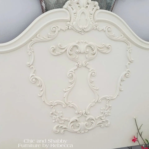 Vintage-style headboard featuring ornate details and neutral tones that complements Drop Cloth Chalk Mineral Paint For Furniture In Matte Linen White 16 Oz Easy DIY Chalk Finish For Wood Metal And Plastic Neutral Warm Tone That Vibes With Any Palette On Cabinets Tables And Dressers.