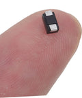 100 Piece Rectifier Diode Assortment Kit With High Voltage Power Supply Components For Industrial And Automotive Systems shown on fingertip.