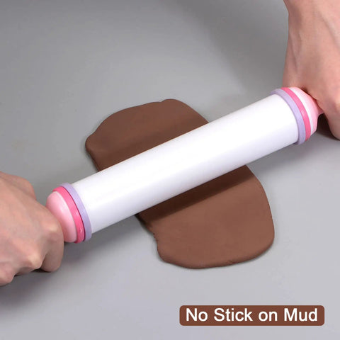 Silicone Rolling Pin For Baking 20.5 Inch Nonstick Kitchen Roller with rubber handles rolling brown dough.