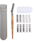 Get Your Brows In Tip Top Shape With This Manual Eyebrow Shaper Trimmer Featuring A Wooden Handle And Safety Mesh Guard For Dead On Facial Hair Removal For Men And Women Plus Stainless Steel Refills, includes trimmer and ten blades in case.